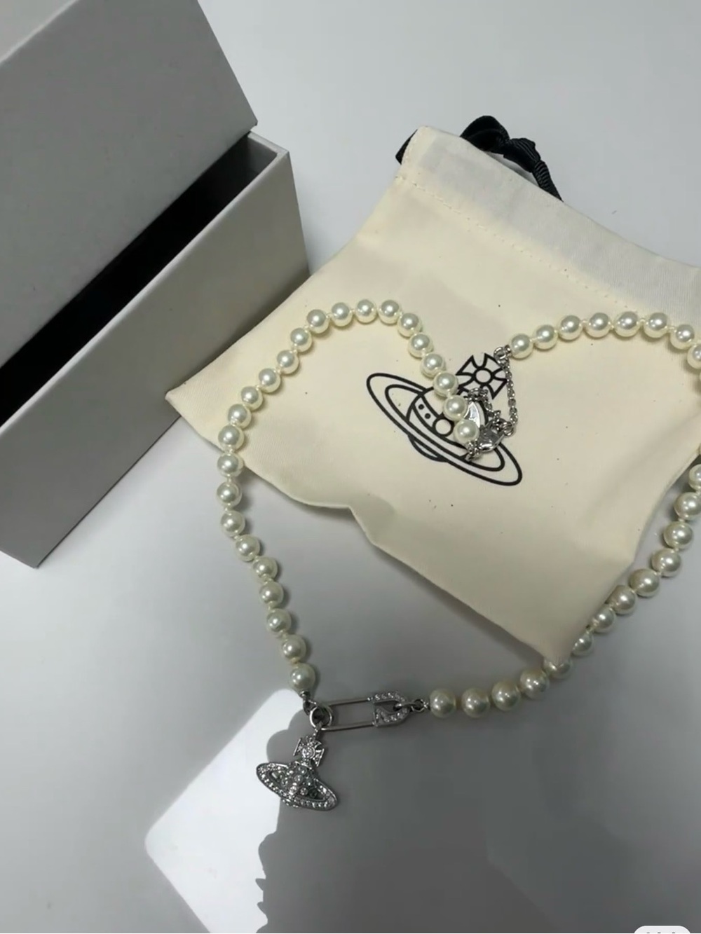 Pearl Necklace with Silver Orb and Safety-Pin Charm - White
